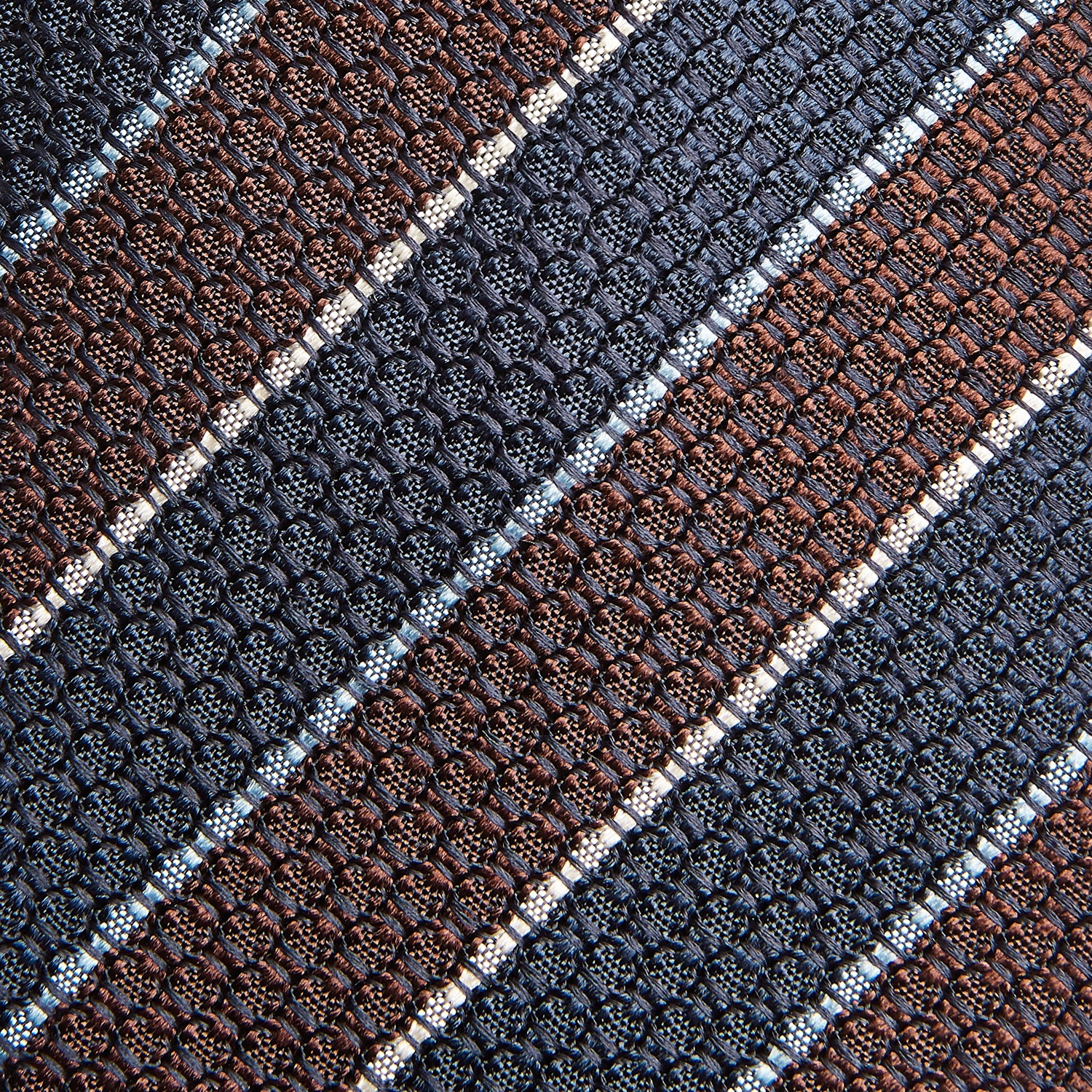 View 3 of product The Turnbull & Asser Burgundy & Navy Multi Stripe Silk Tie features bold stripes and a textured, woven silk design—ideal for adding sophistication to any formal ensemble.