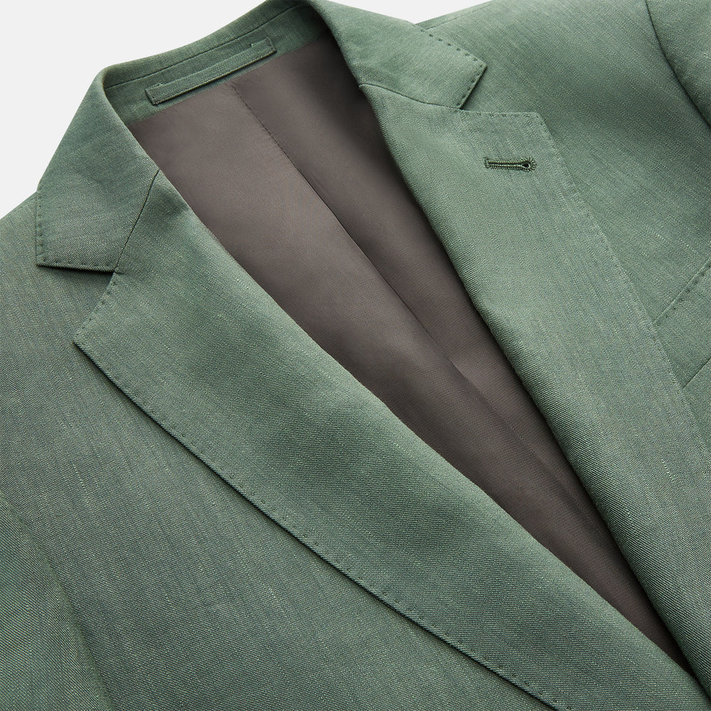 The Turnbull & Asser Green Wool and Linen Blend Barrington Blazer features a single-breasted design, notched lapel, two buttons, three front pockets, brown lining, and is shown on a plain white background.