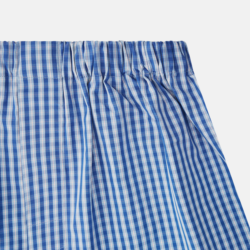 Turnbull & Asser Navy Multi Cotton Godfrey Boxers feature blue and white checks, an elastic waistband, and are shown flat on a white background—ideal for those seeking luxurious men’s underwear.