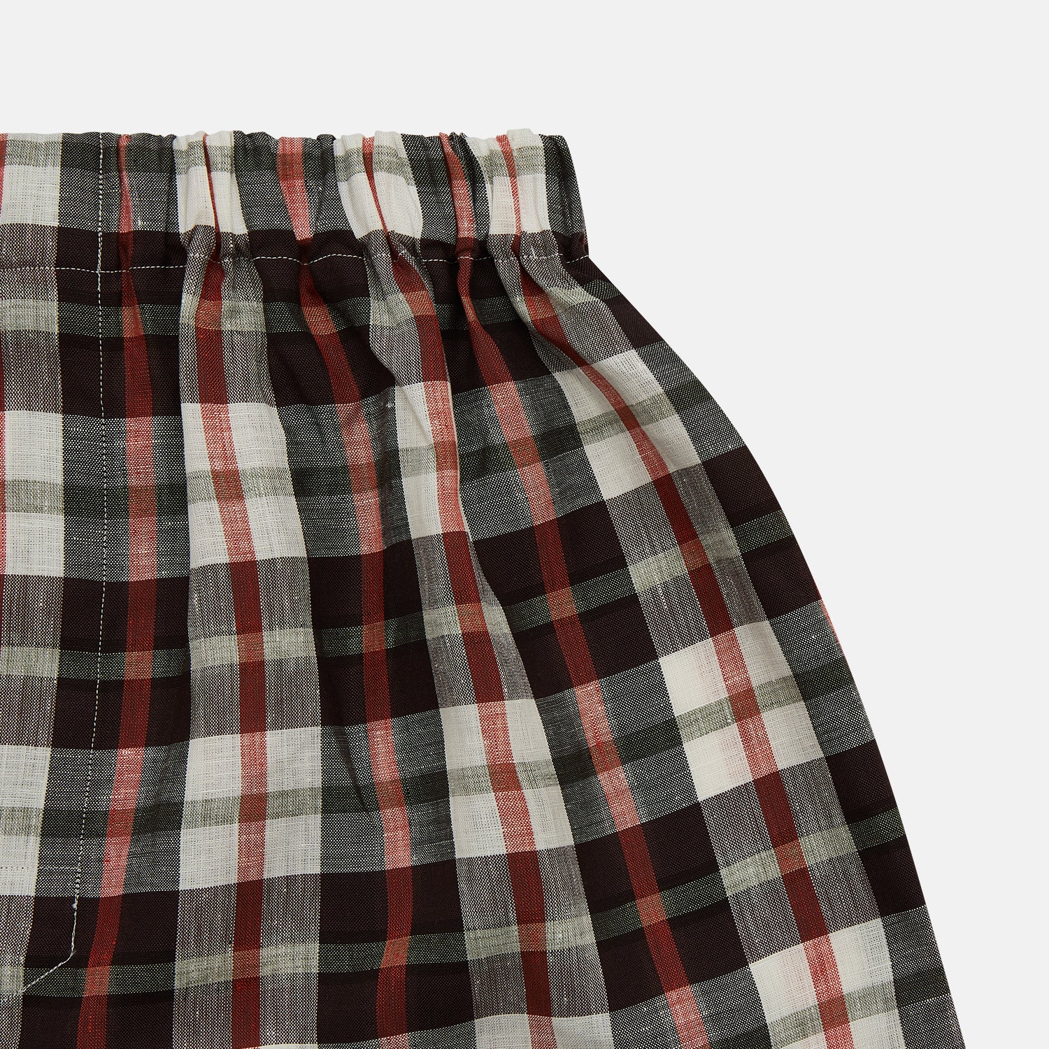 View 2 of product The Black Multi Check Linen Blend Godfrey Boxer Shorts by Turnbull & Asser feature an elastic waistband and a pattern of black, white, red, and beige checks. These luxury underwear essentials are displayed flat on a white background.
