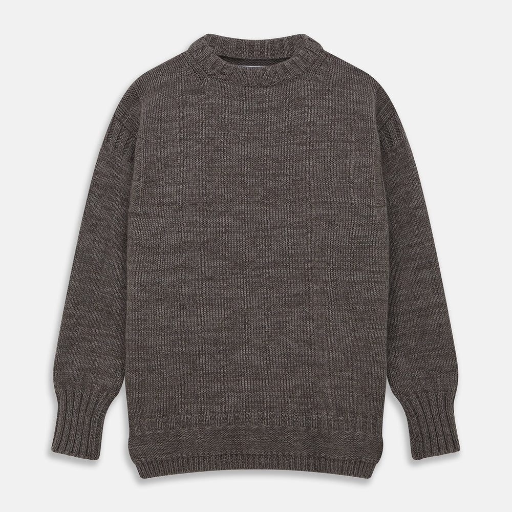 The Turnbull & Asser Fallow Wool and Cotton Blend Lewis Guernsey Jumper is a plain, long-sleeved dark gray knit with ribbed crew neck, cuffs, and hem, shown laid flat on a white background.
