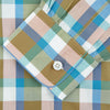 View 3 of product The Green and Pink Multi Check Linen Blend Sussex Nightshirt by Turnbull & Asser is a soft, long-sleeved sleepwear piece with a colorful plaid pattern, button-down front, chest pocket, and rounded hem—ideal as stylish luxury nightwear.