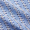 View 3 of product The Turnbull & Asser Pale Blue Multi Check Cotton Sussex Nightshirt features a classic plaid pattern, brown piping accents, button-down front, chest pocket, and curved hem—a timeless long-sleeve sleepwear essential.