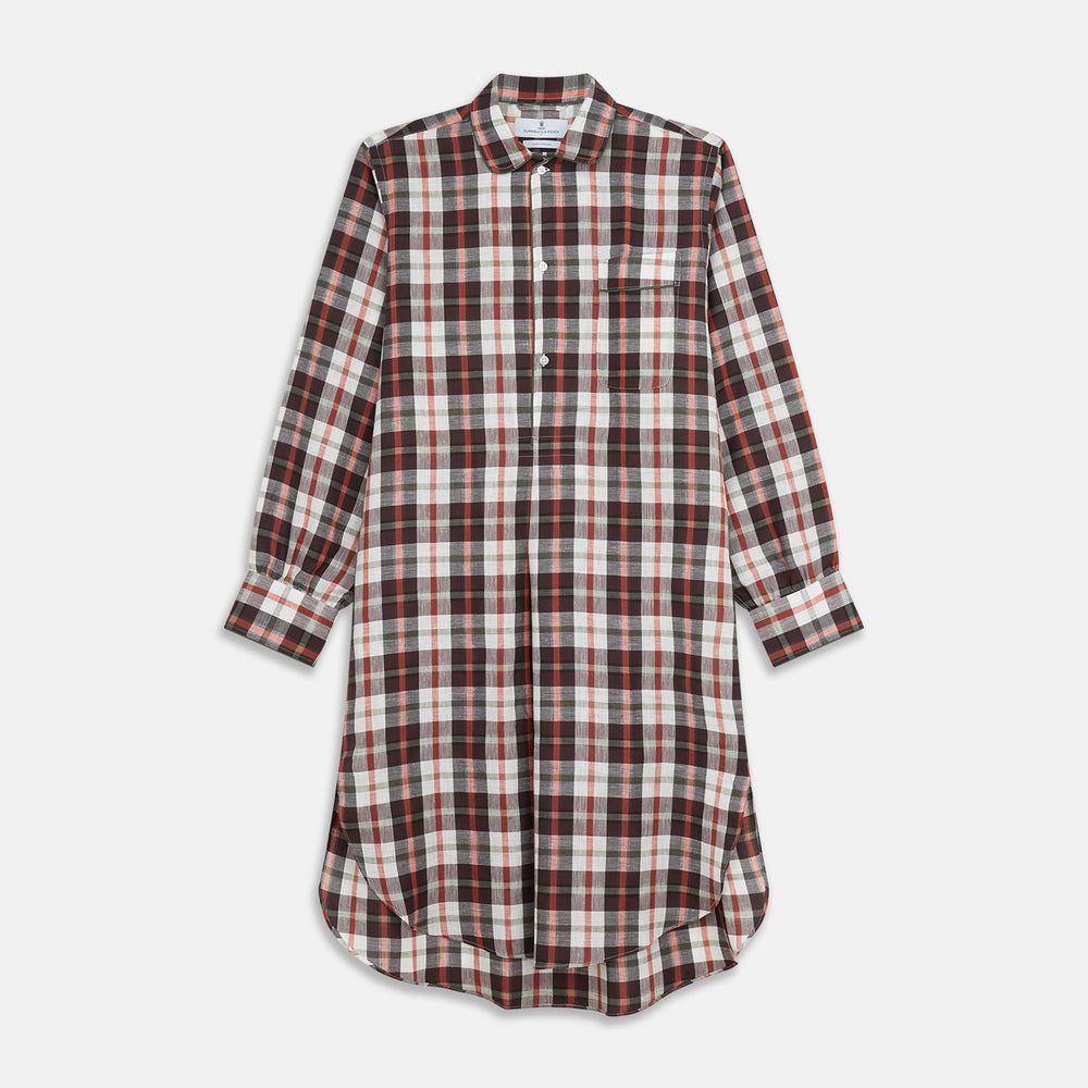 The Black Multi Check Linen Blend Sussex Nightshirt by Turnbull & Asser features a red, black, and white check pattern, button-down front, chest pocket, curved hemline, and brings a luxurious touch to classic sleepwear style.