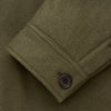 View 9 of product The Green Quilted Cashmere Amhurst Overshirt by Turnbull & Asser features a collar, long sleeves, button-flap chest pockets, and thermo-regulating graphene wadding. Displayed on a plain white background.