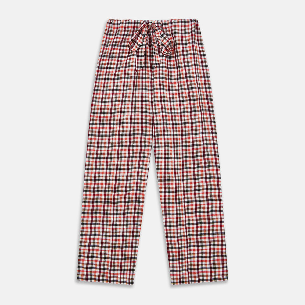 The Turnbull & Asser Green Multi Check Linen Blend Quin Pyjama Set, featuring a long-sleeve button-up shirt and pants with green multi check pattern and adjustable tie-waist, is laid flat on a white background.