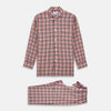 View 1 of product The Turnbull & Asser Green Multi Check Linen Blend Quin Pyjama Set, featuring a long-sleeve button-up shirt and pants with green multi check pattern and adjustable tie-waist, is laid flat on a white background.