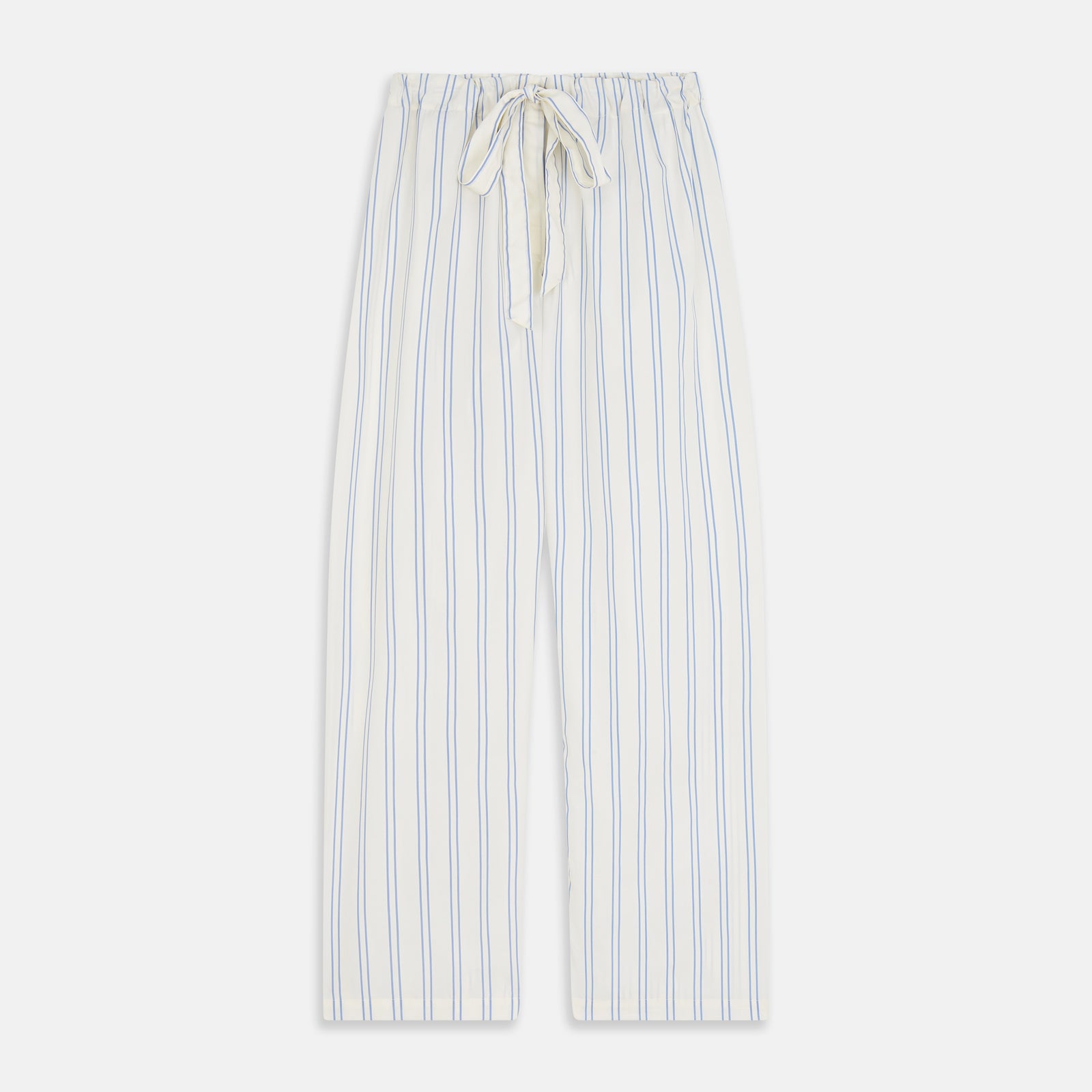 View 6 of product The Turnbull & Asser Women's Blue Multi Cotton Thelma Pyjama Set features a long-sleeve button-up shirt with collar and pocket, plus matching drawstring pants, elegantly displayed against a white background.