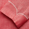 View 3 of product The Pink Linen Arnold Gown by Turnbull & Asser features white piping, long sleeves, a shawl collar, chest pocket, and a wrap-around belt tied at the waist, shown on a white background.