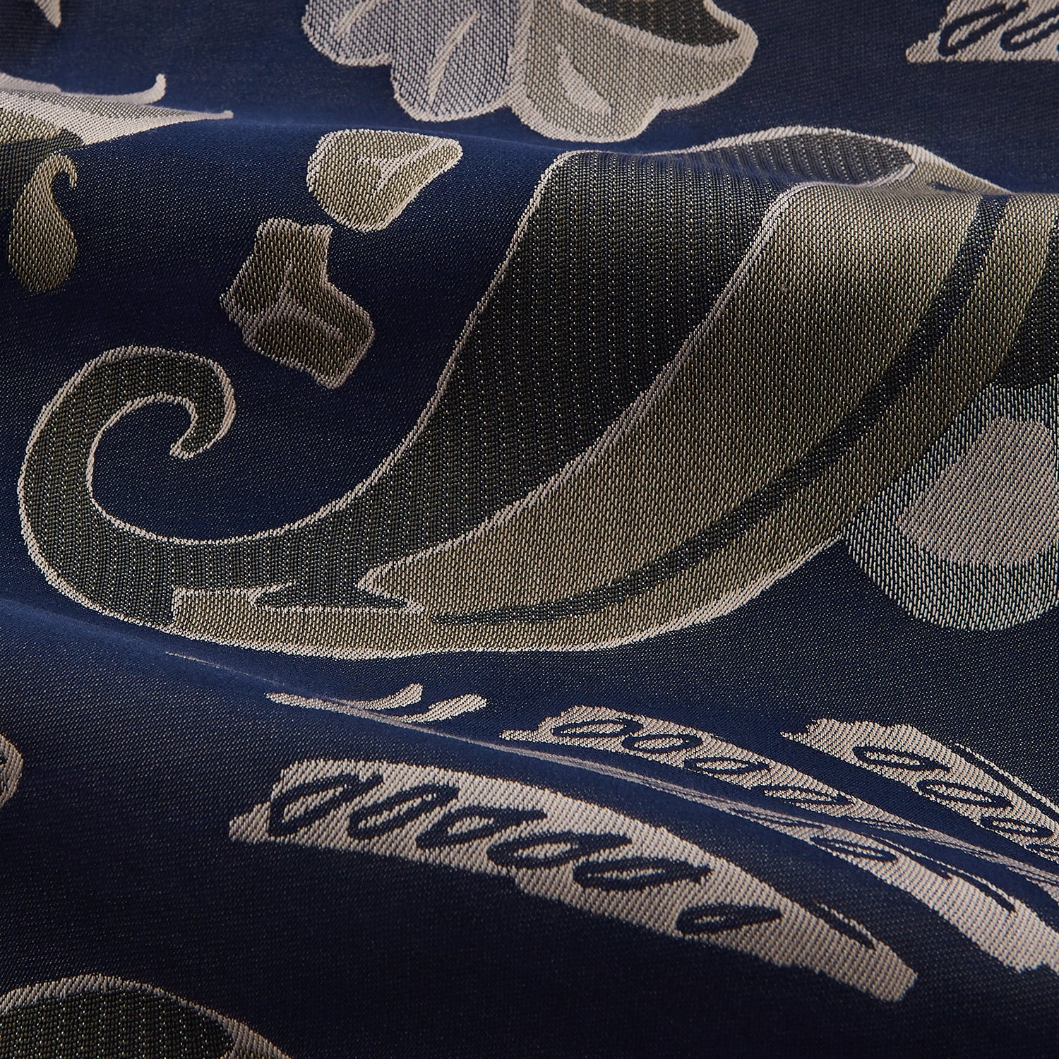 View 2 of product A navy paisley pattern cotton Arnold Gown by Turnbull & Asser, featuring a belted waist and intricate design.