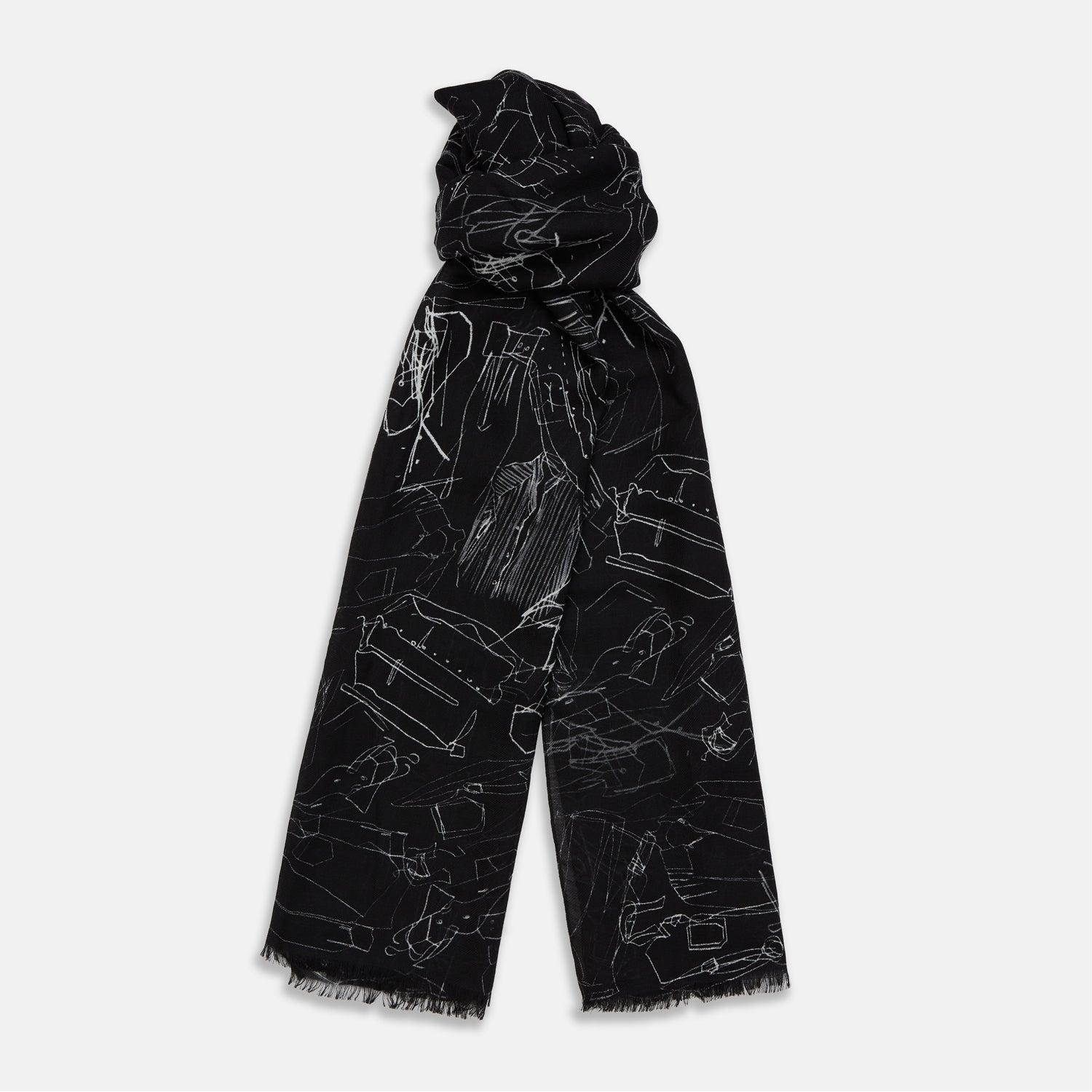 View 1 of product The Turnbull & Asser Black Sketched Pattern Wool Chilcott Scarf features white abstract lines, frayed edges, and is shown loosely knotted on a light gray background.