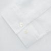 View 2 of product The Turnbull & Asser White Linen Holiday Fit Winnington Shirt, a long-sleeve style with a revere collar and chest pocket, is shown laid flat on a white background.