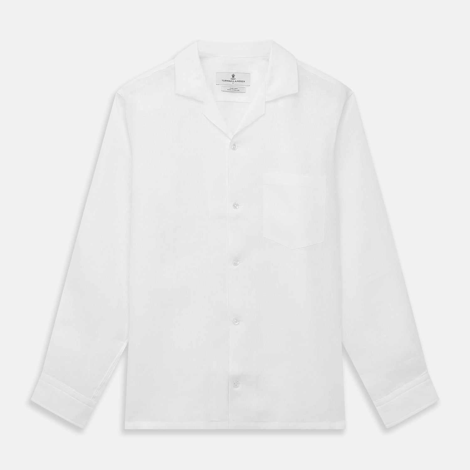View 1 of product The Turnbull & Asser White Linen Holiday Fit Winnington Shirt, a long-sleeve style with a revere collar and chest pocket, is shown laid flat on a white background.