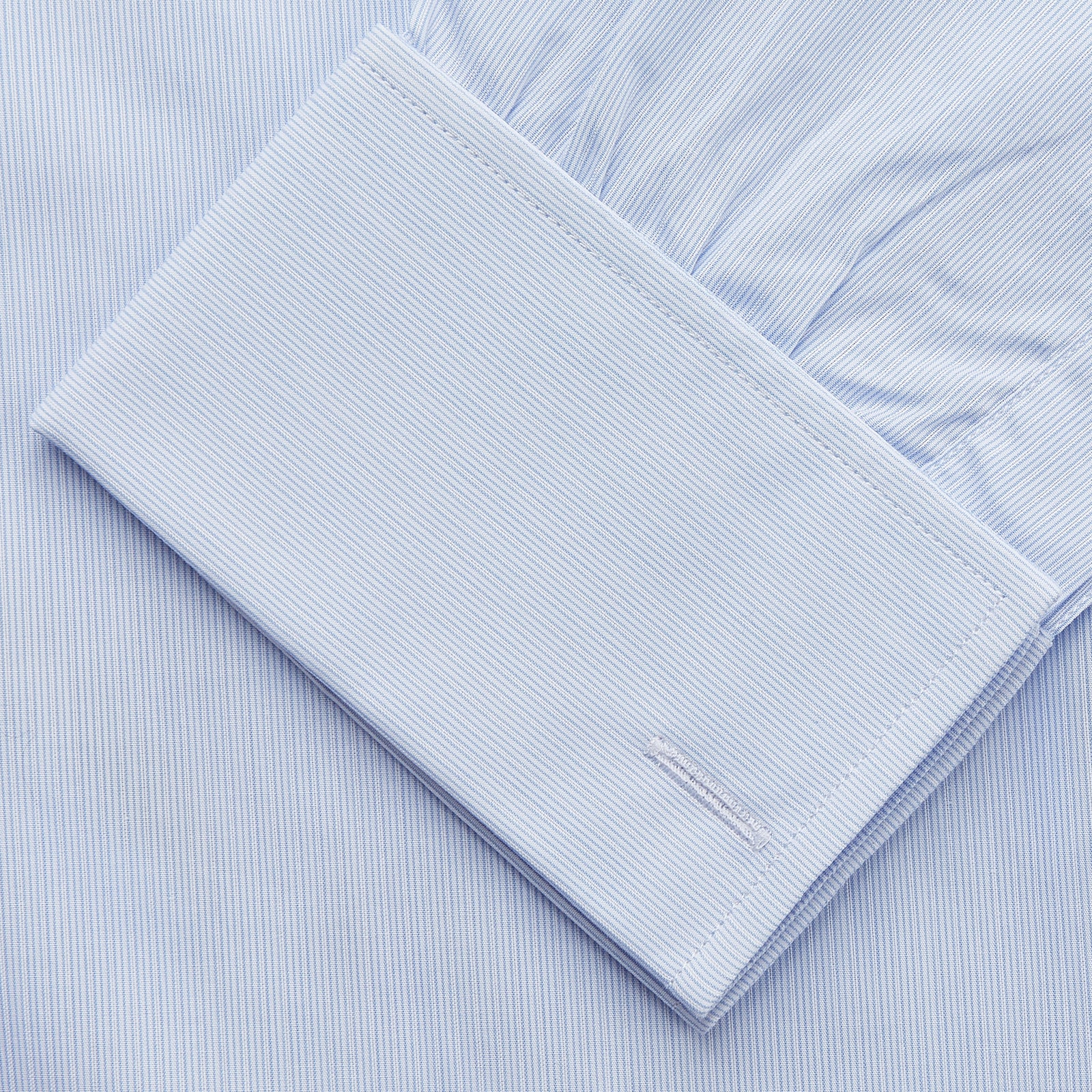 View 3 of product The Turnbull & Asser Pale Blue Multi Stripe Cotton Regular Fit Whitby Shirt features long sleeves, a classic collar, and buttoned cuffs, shown laid flat on a white background.