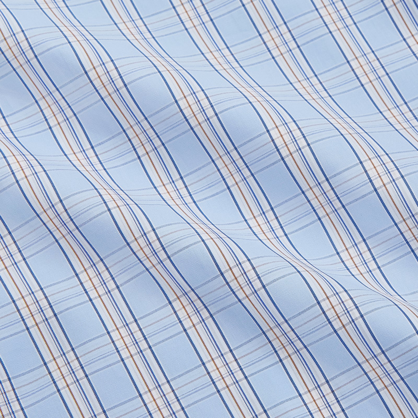View 4 of product The Turnbull & Asser Pale Blue Multi-check Cotton Regular Fit Mayfair Shirt, featuring a classic T&A collar and buttoned cuffs, is displayed laid flat on a white background.