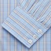 View 3 of product The Turnbull & Asser Pale Blue Multi-check Cotton Regular Fit Mayfair Shirt, featuring a classic T&A collar and buttoned cuffs, is displayed laid flat on a white background.