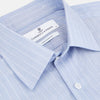 View 3 of product Navy Turnbull & Asser Mayfair shirt in textured cotton, regular fit with a sharp T&A collar and white buttons, laid flat on a white background.