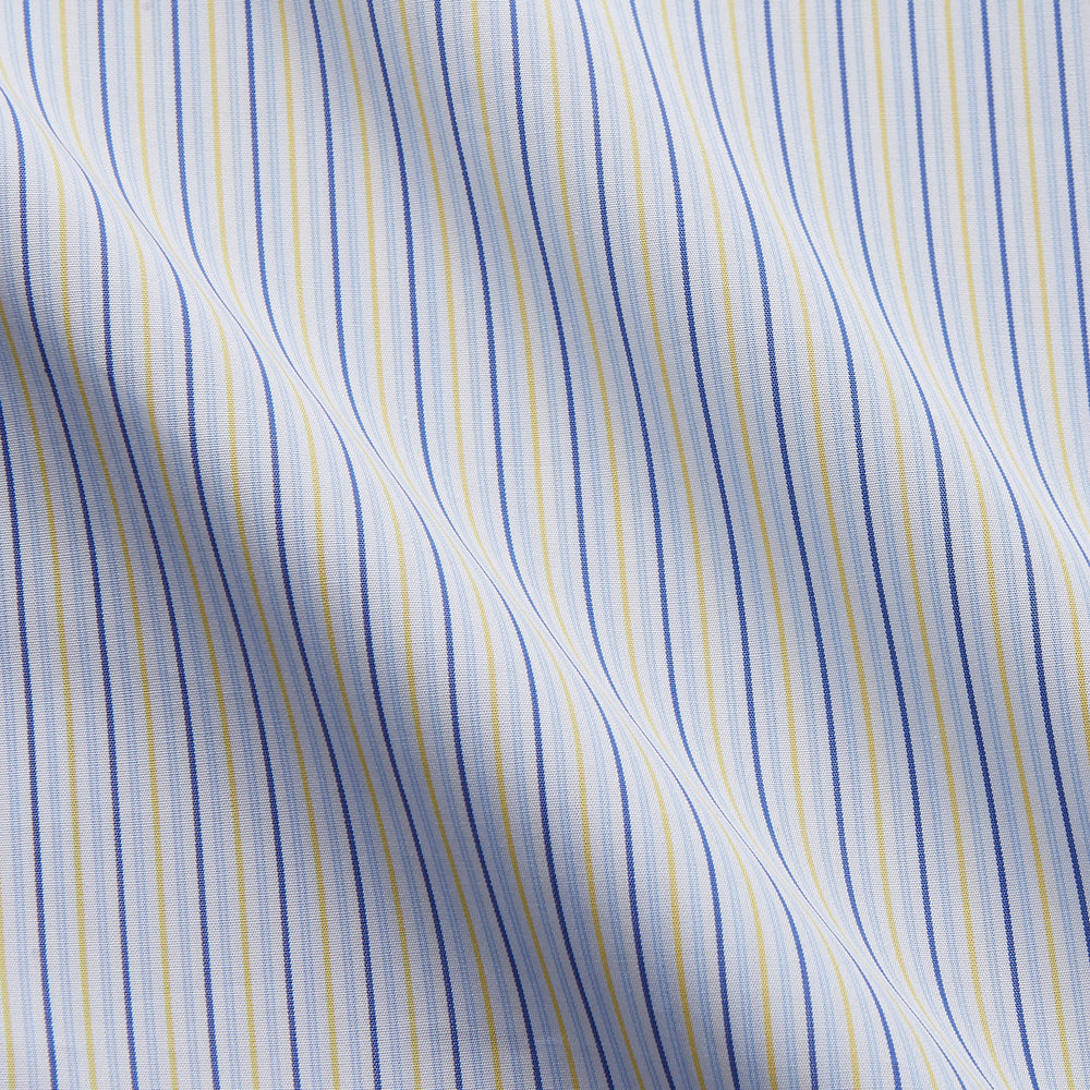 The Light Blue and Yellow Stripe Cotton RE-PURPOSE Mayfair Shirt by Turnbull & Asser features long sleeves, a classic collar, buttoned cuffs, a curved hem, and is made from recycled cotton for sustainable style.