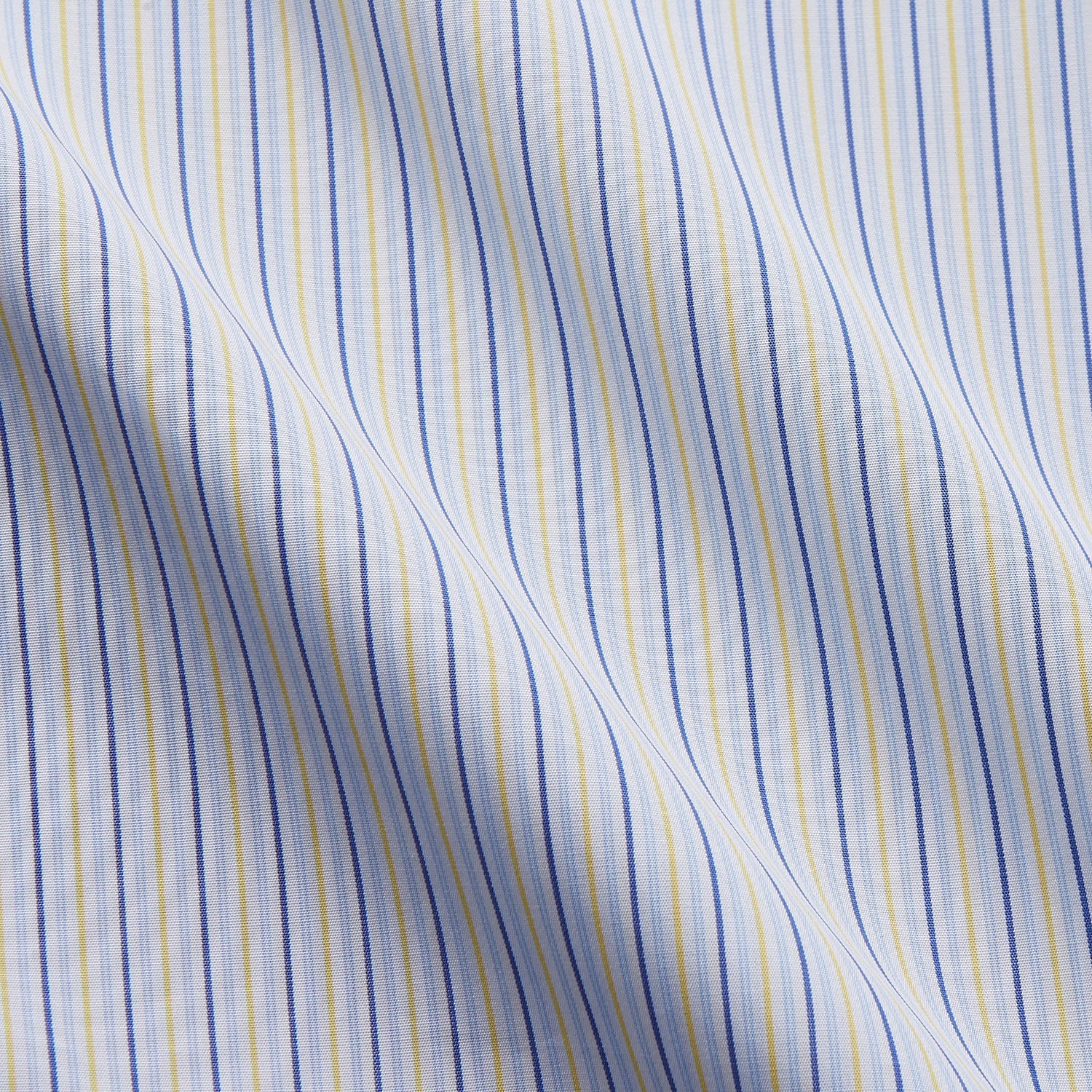 View 4 of product The Light Blue and Yellow Stripe Cotton RE-PURPOSE Mayfair Shirt by Turnbull & Asser features long sleeves, a classic collar, buttoned cuffs, a curved hem, and is made from recycled cotton for sustainable style.