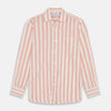 View 2 of product A man poses against a beige backdrop in the Turnbull & Asser Red and Off-White Stripe Cotton Weekend Fit Finch Shirt, styled with dark blue jeans and a brown belt for a timeless look. One hand rests in his pocket as he faces slightly to the side.