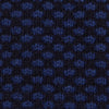 View 3 of product The Turnbull & Asser Navy Multi Cashmere Knitted Tie features a subtle black checkered pattern and is shown rolled up against a plain light background.