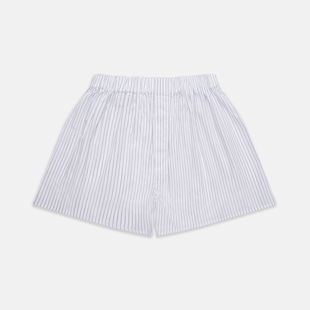Turnbull & Asser's White and Blue Halo Stripe Cotton Godfrey Boxer Shorts feature thin vertical blue stripes, an elastic waistband, and offer comfortable sleepwear. The shorts are shown laid flat on a plain white background.