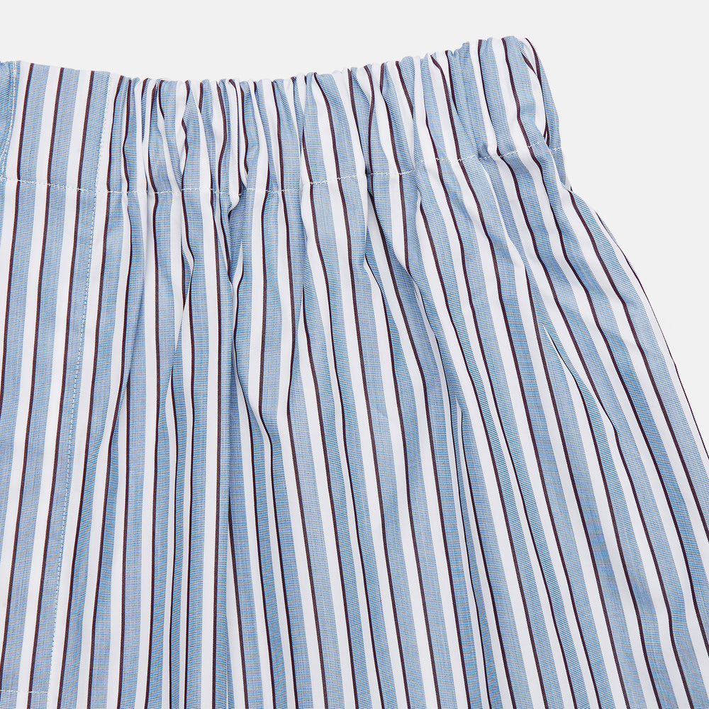 Turnbull & Asser Blue and White Stripe Cotton Godfrey Boxers feature an elastic waistband, shown laid flat on a white background—ideal for those who value luxury underwear.