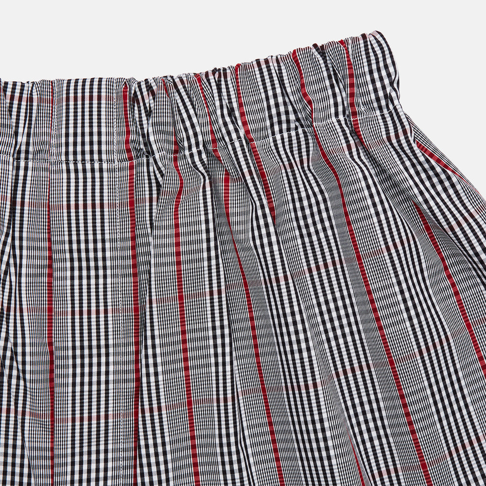 Black Prince of Wales check cotton Godfrey boxer shorts by Turnbull & Asser, featuring a loose fit and elastic waistband in a classic checkered design, displayed flat on a white background.