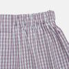 View 2 of product Turnbull & Asser Red and Blue Multi Check Cotton Godfrey Boxers feature a loose fit, knee-length cut, and elastic waistband in a red and blue plaid pattern on white, displayed on a plain background.