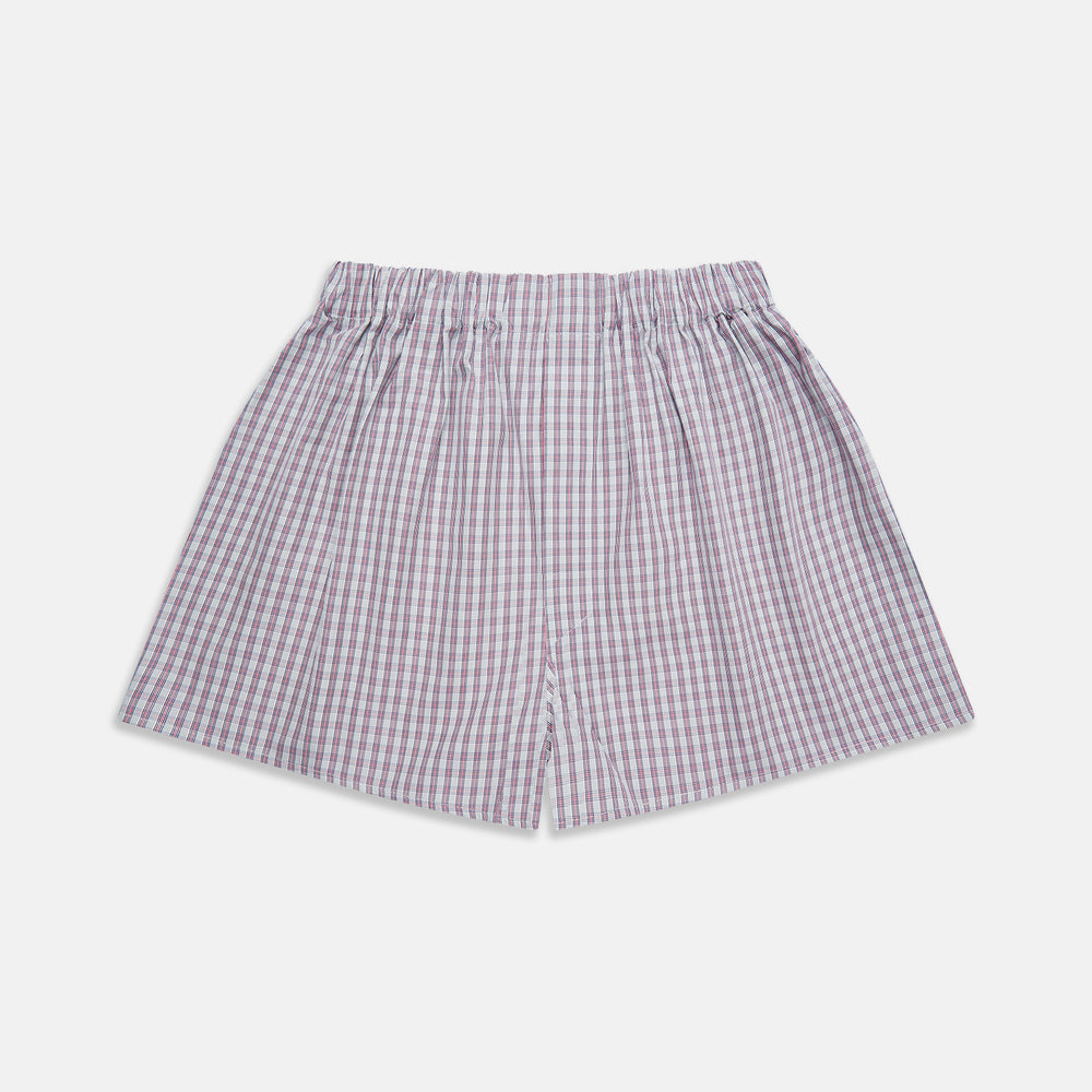 Turnbull & Asser Red and Blue Multi Check Cotton Godfrey Boxers feature a loose fit, knee-length cut, and elastic waistband in a red and blue plaid pattern on white, displayed on a plain background.