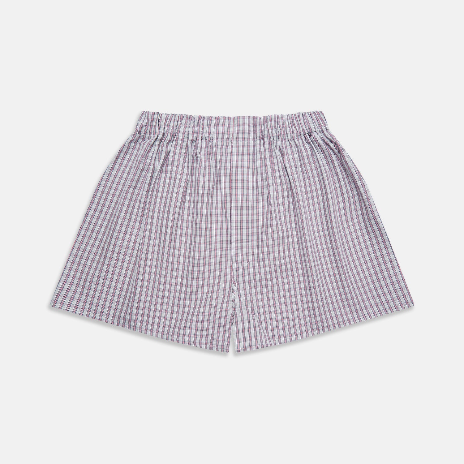 View 1 of product Turnbull & Asser Red and Blue Multi Check Cotton Godfrey Boxers feature a loose fit, knee-length cut, and elastic waistband in a red and blue plaid pattern on white, displayed on a plain background.