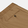 View 2 of product Turnbull & Asser Brown Wool Single Pleat Gerry Trousers with a classic fit, front pleats, belt loops, and side pockets are laid flat on a white background.
