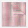 View 1 of product A neatly folded Turnbull & Asser Orange and White Check Cotton Handkerchief, with one corner turned up to show the reverse side.