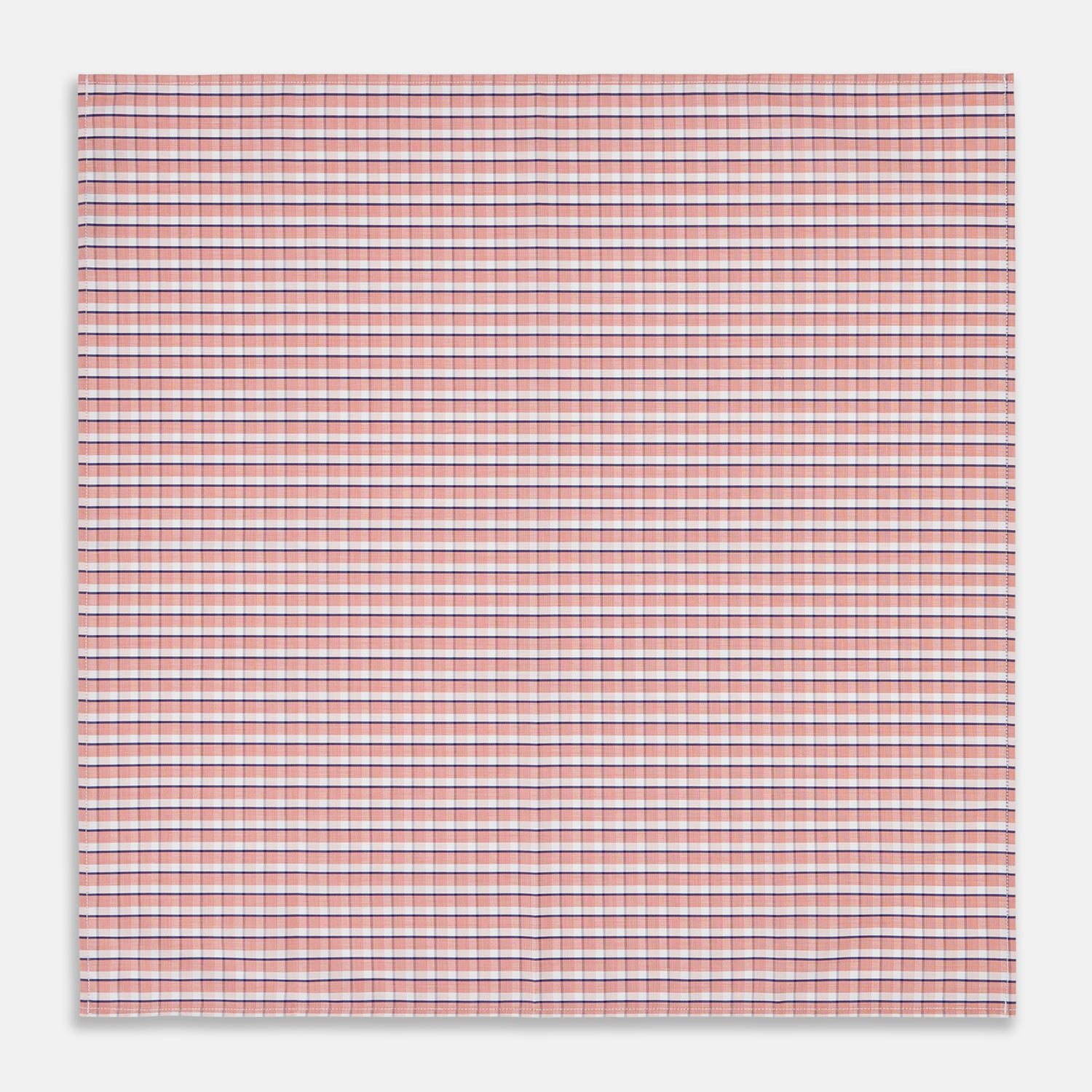 View 3 of product A neatly folded Turnbull & Asser Orange and White Check Cotton Handkerchief, with one corner turned up to show the reverse side.