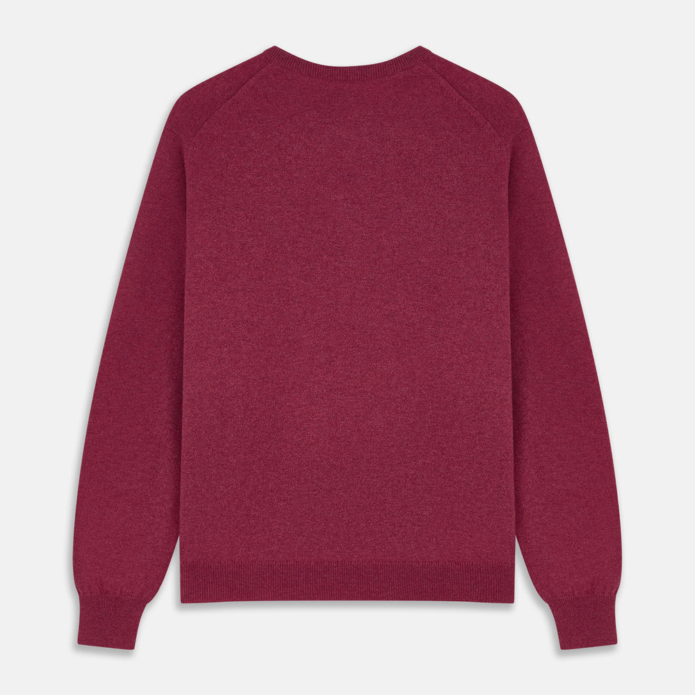 The Turnbull & Asser Soft Burgundy Cashmere Glenn Jumper, a menswear essential with long sleeves and a crew neck in solid dark red, is laid flat on a white background.