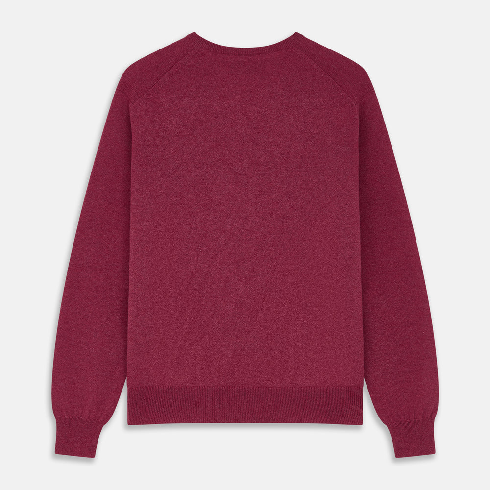 The Turnbull & Asser Soft Burgundy Cashmere V-neck Paden Jumper is displayed flat on a white background, showing off its soft texture and subtle ribbed cuffs and hem.