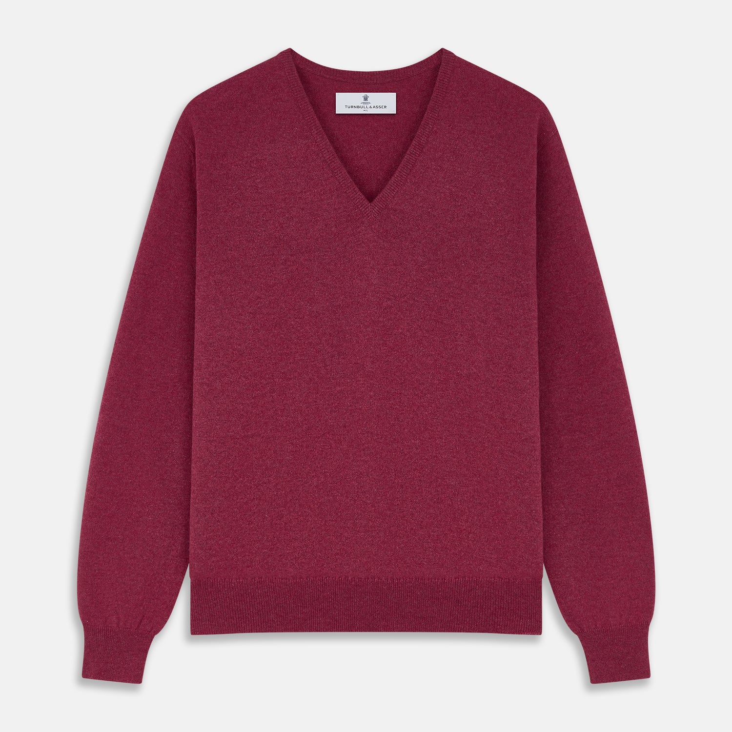 View 1 of product The Turnbull & Asser Soft Burgundy Cashmere V-neck Paden Jumper is displayed flat on a white background, showing off its soft texture and subtle ribbed cuffs and hem.