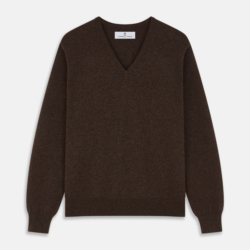 The Brown Cashmere V-neck Paden Jumper by Turnbull & Asser is laid flat on a white background, showcasing its classic design with long sleeves, ribbed cuffs, and hem—perfect for versatile styling.
