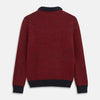 View 3 of product The Turnbull & Asser Red and Navy Wool Blend Billy Jumper features a red knit body with navy ribbed collar, cuffs, and hem, made from a wool and cotton blend, shown on a white background.