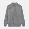View 1 of product The Oatmeal Cashmere Melange Clark Roll Neck Jumper by Turnbull & Asser features a high roll-neck, long sleeves, and a textured cable knit front, crafted from a soft cashmere blend.