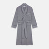 View 1 of product The Navy Houndstooth Wool Arnold Gown by Turnbull & Asser features a shawl collar, front chest pocket, long sleeves, and a matching fabric belt tied at the waist.