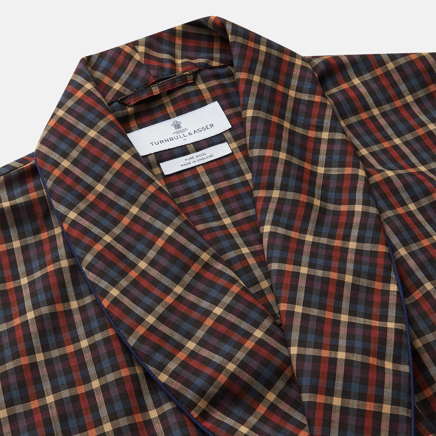 View 2 of product The Blue, Yellow, and Red Multi Check Wool Arnold Gown by Turnbull & Asser features a shawl collar, long sleeves, and matching belt in a plaid pattern. Luxury loungewear is displayed against a white background.