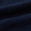 View 3 of product The Deep Navy Cashmere Baldwin Gown by Turnbull & Asser features a ribbed knit, long sleeves, shawl collar, two front pockets, and a waist tie—ideal as luxury loungewear or a chic navy dressing gown.