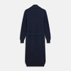 View 4 of product The Deep Navy Cashmere Baldwin Gown by Turnbull & Asser features a ribbed knit, long sleeves, shawl collar, two front pockets, and a waist tie—ideal as luxury loungewear or a chic navy dressing gown.