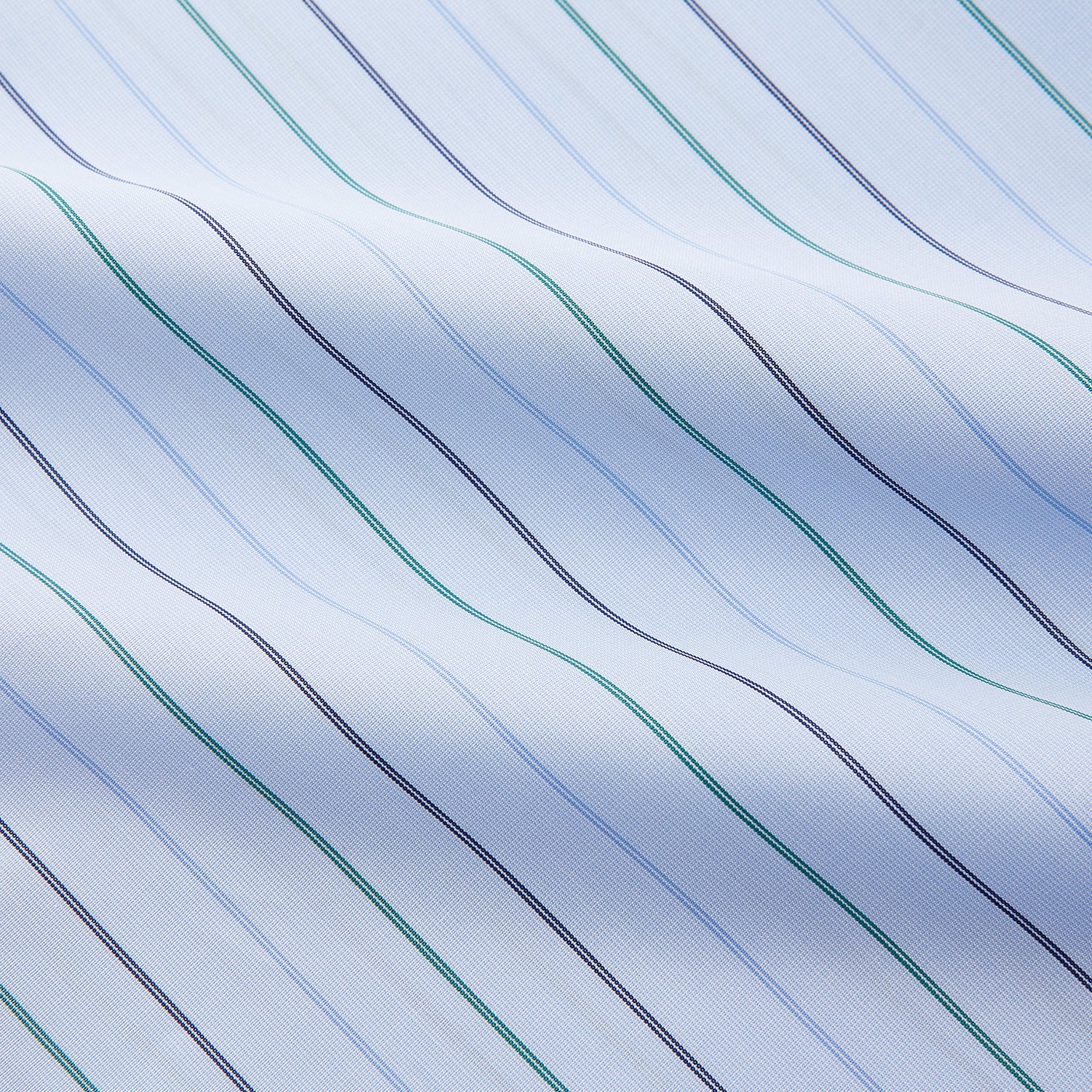 View 2 of product The Turnbull & Asser Pale Blue and Green Halo Stripe Cotton Regular Fit Mayfair Shirt features subtle stripes, long sleeves, a signature T&A collar, and cuffed sleeves, shown against a white background.