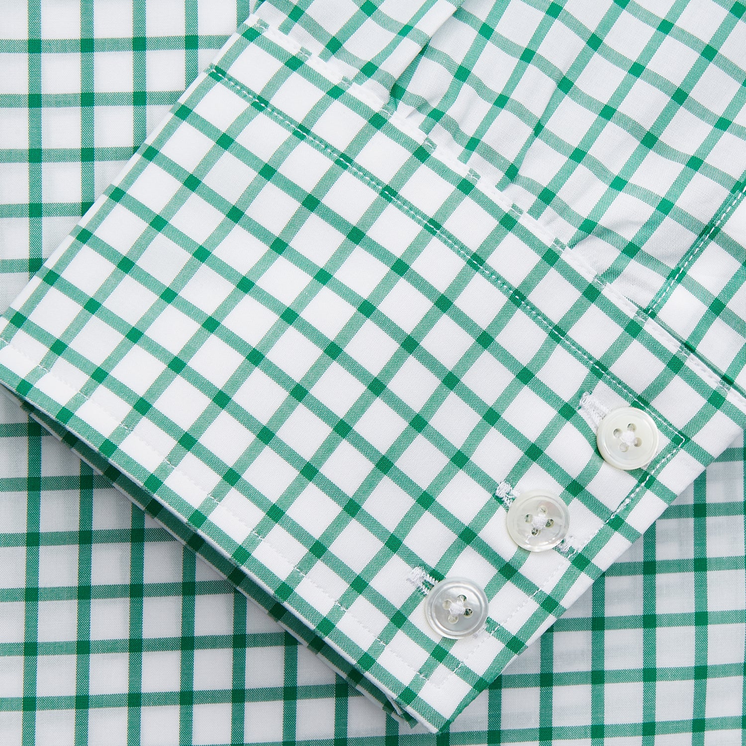 View 3 of product The Turnbull & Asser Green Check Cotton Regular Fit Mayfair Shirt features a green and blue check pattern on white, shown laid flat against a plain white background—a classic, versatile pick for any men’s wardrobe.
