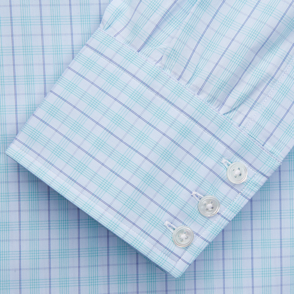 The Turnbull & Asser Pale Blue and Green Multi Check Cotton Regular Fit Mayfair Shirt features a classic collar, long sleeves, white buttons, and a subtle checkered pattern—an essential for any men’s wardrobe, shown on a plain white background.