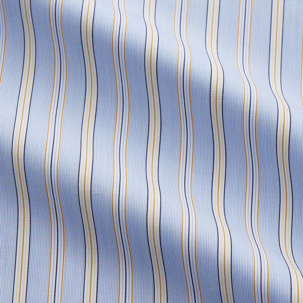 The Turnbull & Asser Blue and Yellow Multi Stripe Cotton Regular Fit Mayfair Shirt features thin vertical stripes in white, blue, and tan, a collared design with white buttons—an essential formal staple for any man’s wardrobe.