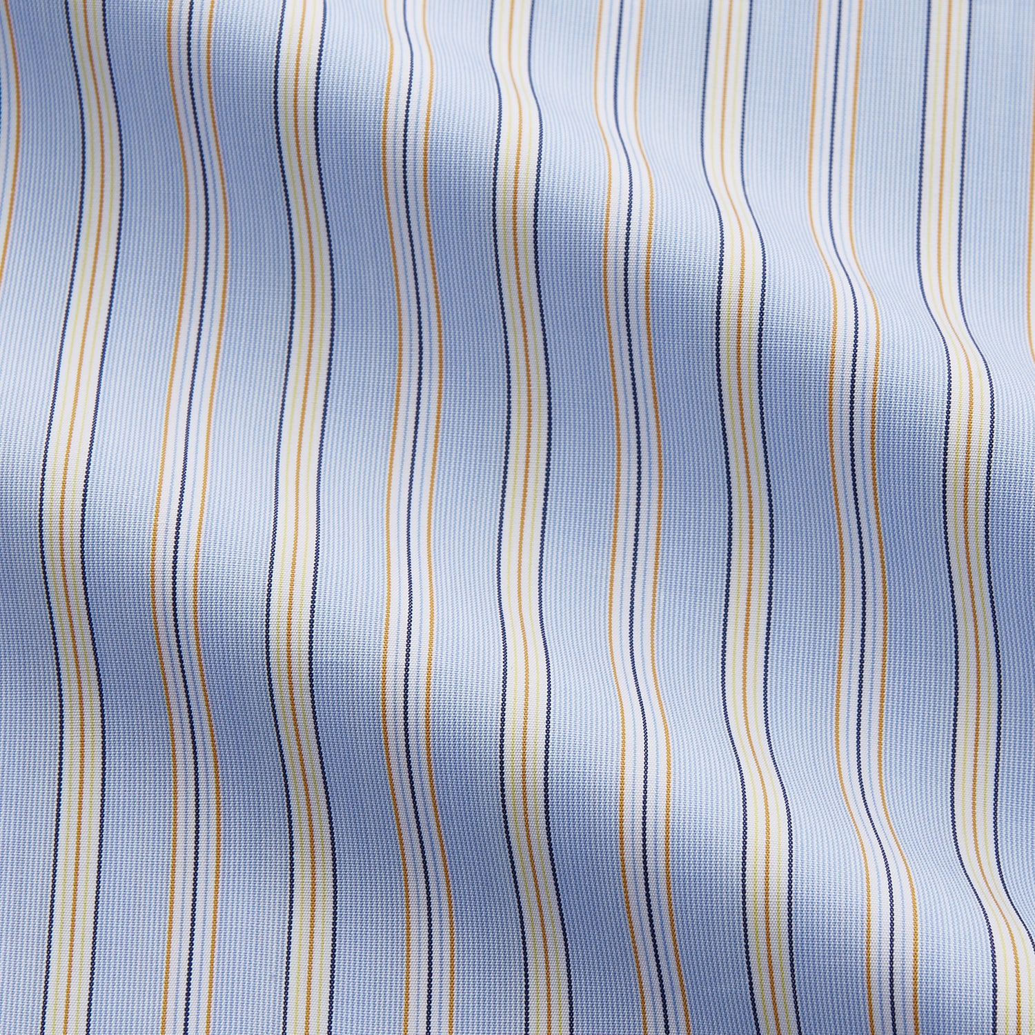 View 3 of product The Turnbull & Asser Blue and Yellow Multi Stripe Cotton Regular Fit Mayfair Shirt features thin vertical stripes in white, blue, and tan, a collared design with white buttons—an essential formal staple for any man’s wardrobe.