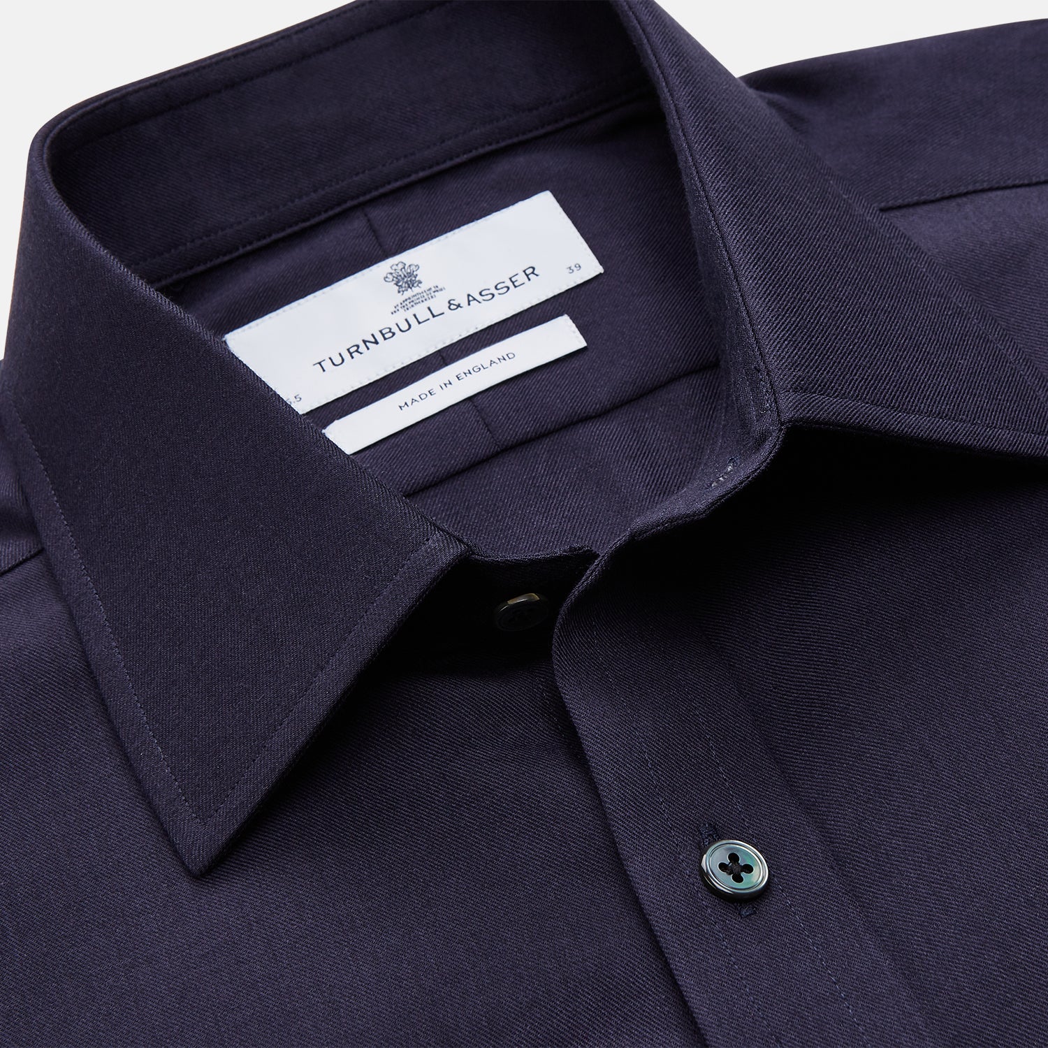 View 3 of product The Turnbull & Asser Navy Cotton and Wool Blend Regular Fit Mayfair Shirt features long sleeves, white buttons, a classic collar, and cuffed sleeves—a refined addition to the Mayfair collection.